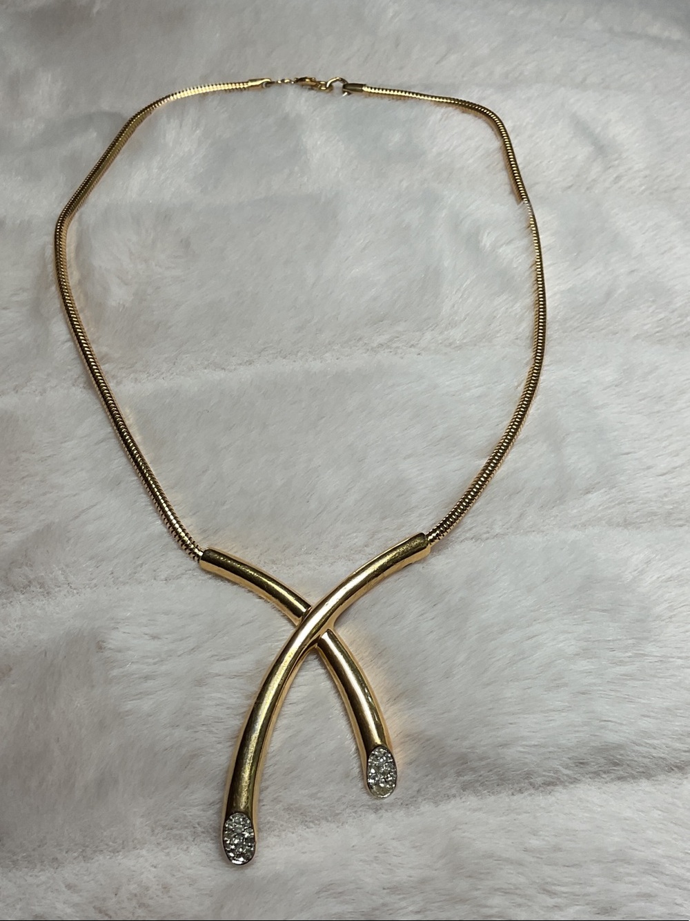 Gold Crossover Pendant Necklace with Crystal Tips